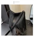 Close-up of black litchi grain leather bucket bag with dense hanging tassels - Black