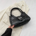 Retro black leather handbag with white contrast stitching and a large silver square buckle - Black