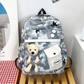 Gray-blue camouflage school backpack with a plush bear charm and front pocket - Light Gray