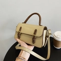 Retro cream and brown contrast shoulder bag with golden hardware and buckle detail - Khaki