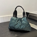 Quilted tote bag in glossy dark green finish with comfortable black wide straps - Green