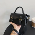 Classic black rectangular flap handbag with white contrast stitching and gold buckles - Black
