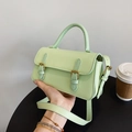 Minimalist mint green square handbag in faux leather with dual gold buckles and shoulder strap - Green