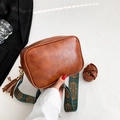 Vintage brown PU leather crossbody bag with ethnic jacquard strap and tassel detail - Brown