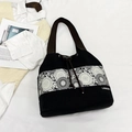 Minimalist black canvas drawstring bucket bag with white floral lace trim details - Black