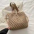 Quilted tote bag in khaki beige with drawstring detail and wide woven handle strap - Khaki