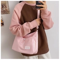 Pink crossbody dumpling bag with drawstring and fashion label in Korean casual style - Pink