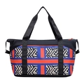 Large travel bag with black and geometric blue-orange patterns and separate shoe compartment - Horizontal Pattern