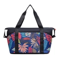 Large capacity travel tote bag featuring vibrant tropical palm leaf prints and black handles - Colorful Leaves