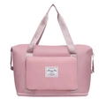 Pink waterproof nylon travel bag with large capacity and expandable bottom layer design - Deep Pink