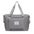 Large gray travel duffel bag with expandable zipper and durable fabric handles - Gray