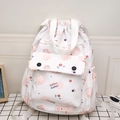 White drawstring backpack with pink cartoon bunnies and cute floral print for students - Rabbit White