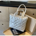 Quilted tote bag in glossy white fabric featuring a puffy diamond lattice design - Off White