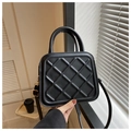 Elegant black quilted crossbody bag with diamond pattern and dual top handles in matte finish - Black