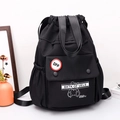 Zaino nero con coulisse in tessuto Oxford con stampa orso e tasca frontale fibbia - Orso Bambino