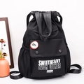 Zaino nero in Oxford con coulisse, toppa rossa OFF e grafiche bianche artistiche - SWEET