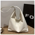 Detailed close-up of cream-white soft PU leather texture and Fashion & Bags brand tag - White