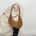Minimalist camel hobo shoulder bag in faux leather with silver buckle and sleek zipper - Khaki