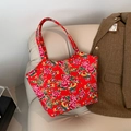Ethnic style large canvas tote bag with red peony and phoenix patterns on sofa - Red