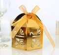 Scatola regalo dorata a forma di carrozzina con intaglio laser e fiocco giallo - Oro Riflettente