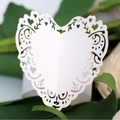 Elegant white laser-cut heart napkin ring with floral hollow pattern for wedding tables - White