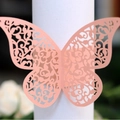 Pink laser-cut butterfly napkin ring with intricate floral patterns for wedding decor - 50 Sheets / Pink