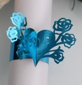 Blue mirror heart napkin ring with LOVE lettering and laser-cut rose floral patterns - Reflective Blue