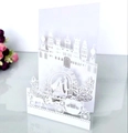 3D laser cut white wedding invitation featuring a castle, couple, and carriage design - White