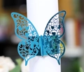 Elegant laser-cut butterfly napkin ring in bright blue for wedding table decorations - Reflective Blue