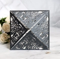 Macro detail of laser-cut rose patterns on elegant black glitter wedding invitations - Charcoal Black