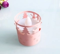 Detail of pink laser-cut paper sleeve with reindeer and tree for LED tealight - Pink