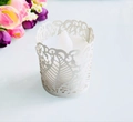 Detailed laser cut white floral paper shade surrounding an LED tea light candle - Pearlescent Silver