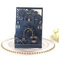 Detail of laser cut navy blue wedding invitation with gold foil castle and carriage motifs - Dark Blue