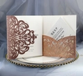 Detail of rose gold laser-cut wedding invitation with glitter finish and RSVP card - Apple Gold