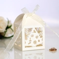 Elegant white laser-cut Christmas tree candy box with a translucent white ribbon bow - Ivory