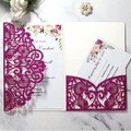 Elegant laser-cut purple glitter wedding invitation set with floral card on marble surface - Glitter Fuchsia