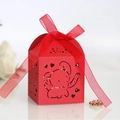 Red paper favor box with laser-cut elephant and heart patterns with a matching ribbon bow - Pearlescent Red