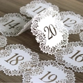 Elegant white laser-cut hollow lace table number cards for wedding banquet decor - White Numbers 11-20