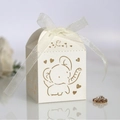 Elegant cream-white laser-cut candy box with hollow elephant motif and organza ribbon bow - Ivory