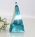 Laser-cut Eiffel Tower favor box in metallic blue finish with white rose accent - Reflective Blue
