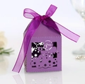 Detail of purple laser-cut angel gift box with stars and crescent moon patterns - Deep purple