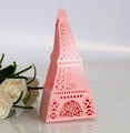 Pink Eiffel Tower hollow favor box with intricate laser-cut floral patterns and paper material - Pink