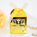 Golden laser-cut Christmas reindeer candy box with yellow organza ribbon on white background - Reflective Gold