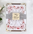 Detail of laser-cut lace wedding invitation with silver glitter belt and floral inner page - Exquisite Floral Hollow Design (HK-90)