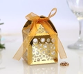 Elegant gold hollowed candy box with decorative orange silk bow for wedding favors - Reflective Gold