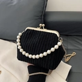 Elegante schwarze Cord-Handtasche mit Perlengriff und goldenem Bügelverschluss - Schwarz