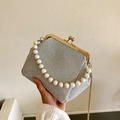 Sparkly silver sequin clutch bag with pearl handle and golden kiss-lock frame - Silver