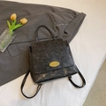 Minimalistischer schwarzer Vintage Rucksack mit Goldplakette und Tulpendekor - Grau