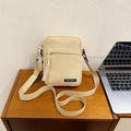 Borsa a tracolla minimalista in tela beige per donna con dettaglio zip in corda intrecciata - Cachi