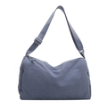 Minimalist grey-blue nylon crossbody pillow bag with adjustable strap on white background - Blue